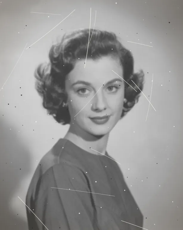 Scratched, blurry black-and-white portrait before choosing which fix comes first
