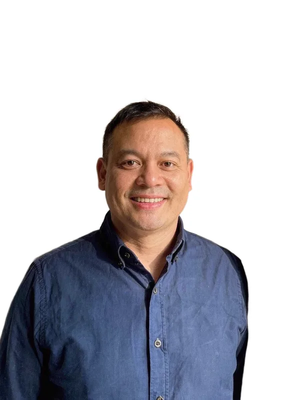 Passport photo after the fix: the same man on a clean white background that meets the rules