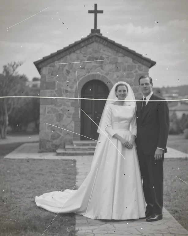 Old photo of a couple in front of a church, with creases, a customer photo for a restoration side business
