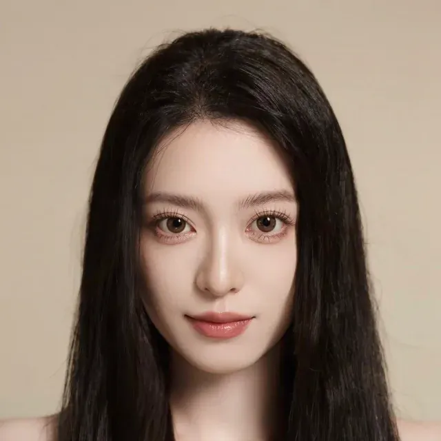 Woman with long black hair before previewing gray hair coverage